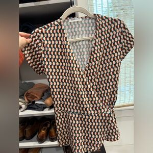 Kettlewell peplum wrap top